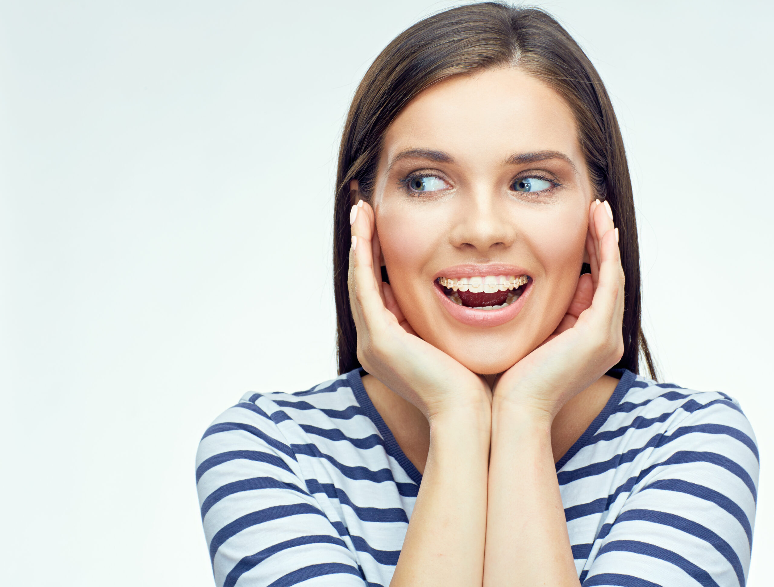 woman smiling clear braces
